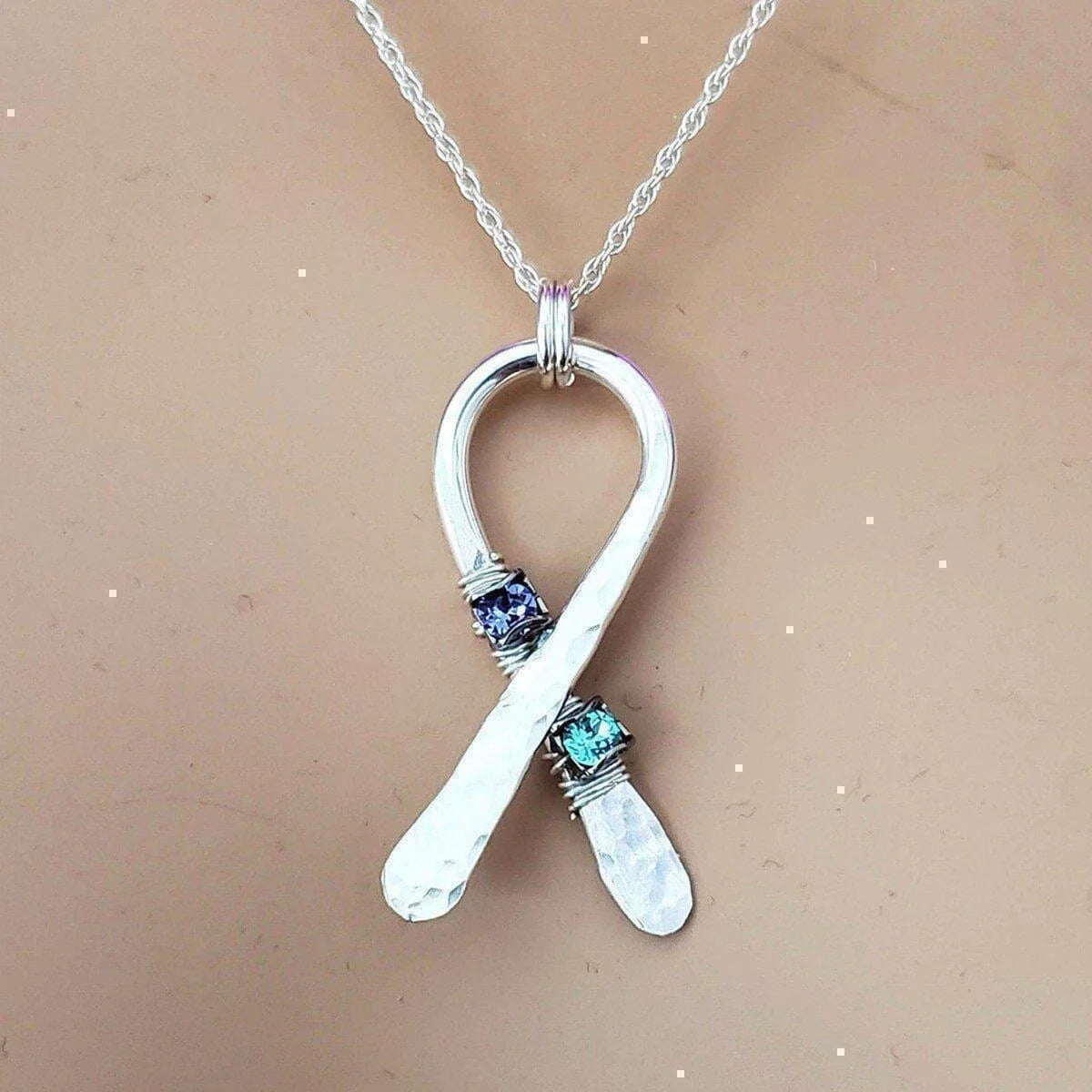 "Stunning Silver Suicide Prevention Necklace with Sparkling Purple and Teal Crystals - Wear Your Support!"